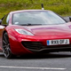 Illustration for article titled Ferrari's public option, the McLaren MP4-12C super car gets emotional, and Scion's iQ shows up